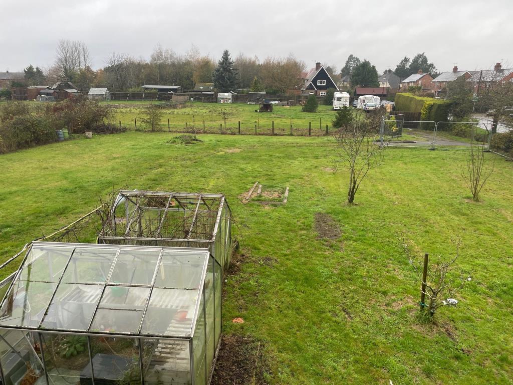 Lot: 81 - SEMI-DETACHED COTTAGE ON 0.4 ACRE PLOT - Side garden view from first floor